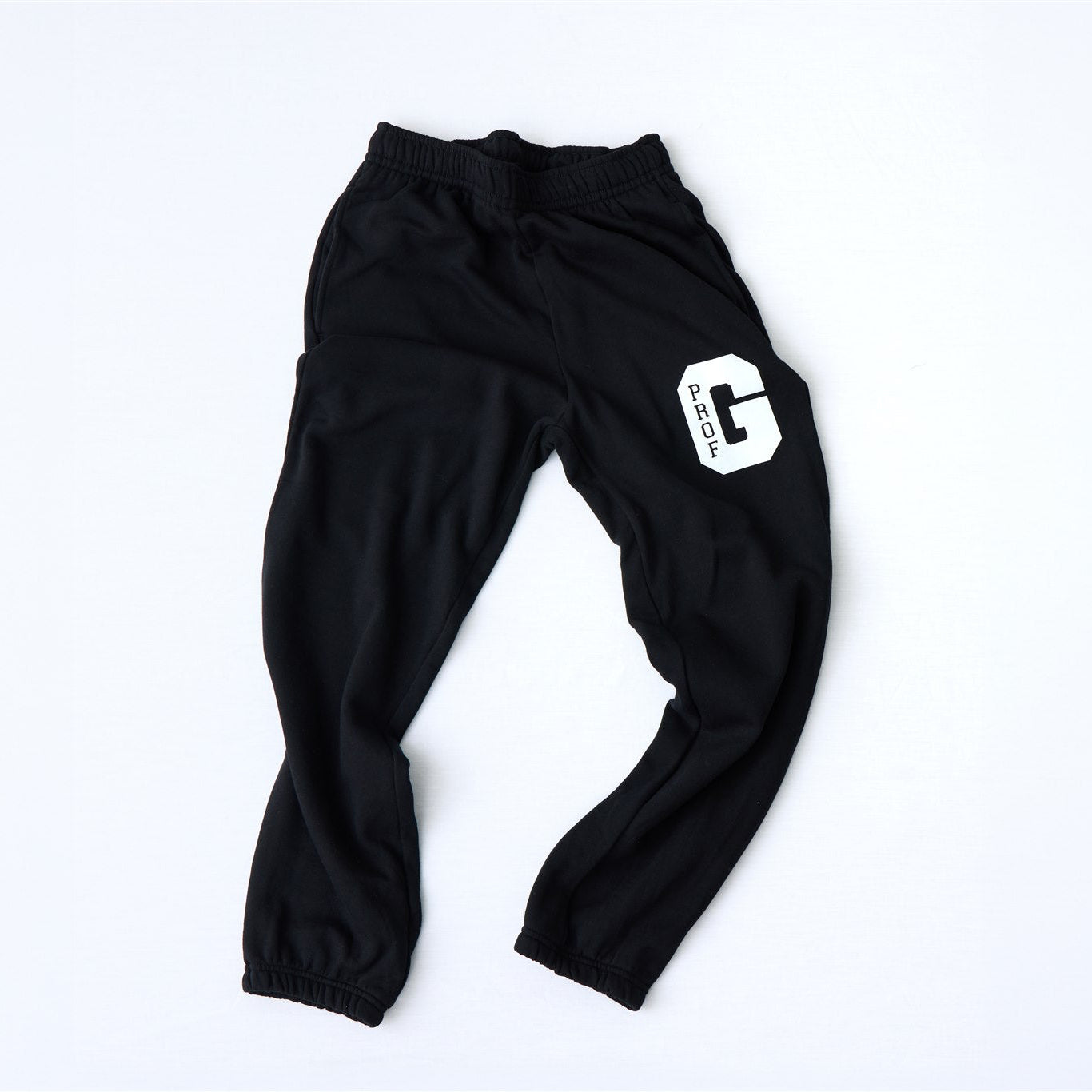 Black Prof G Collegiate jogger sweatpants featuring minimalist white collegiate logo graphic.