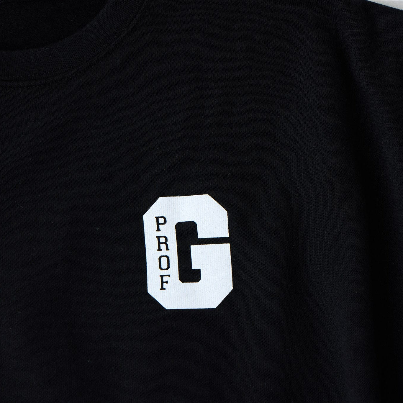Prof G Collegiate logo on front left chest of the Dawg Crewneck.
