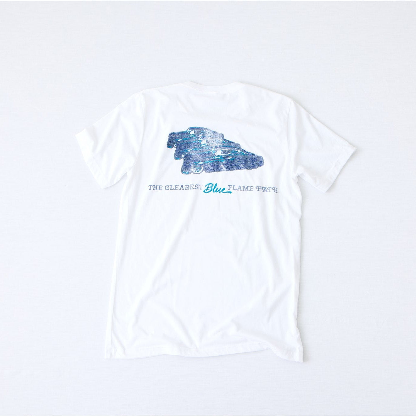 White Blue Flame graphic t-shirt featuring distressed front chest logo and oversized retro blue car back graphic